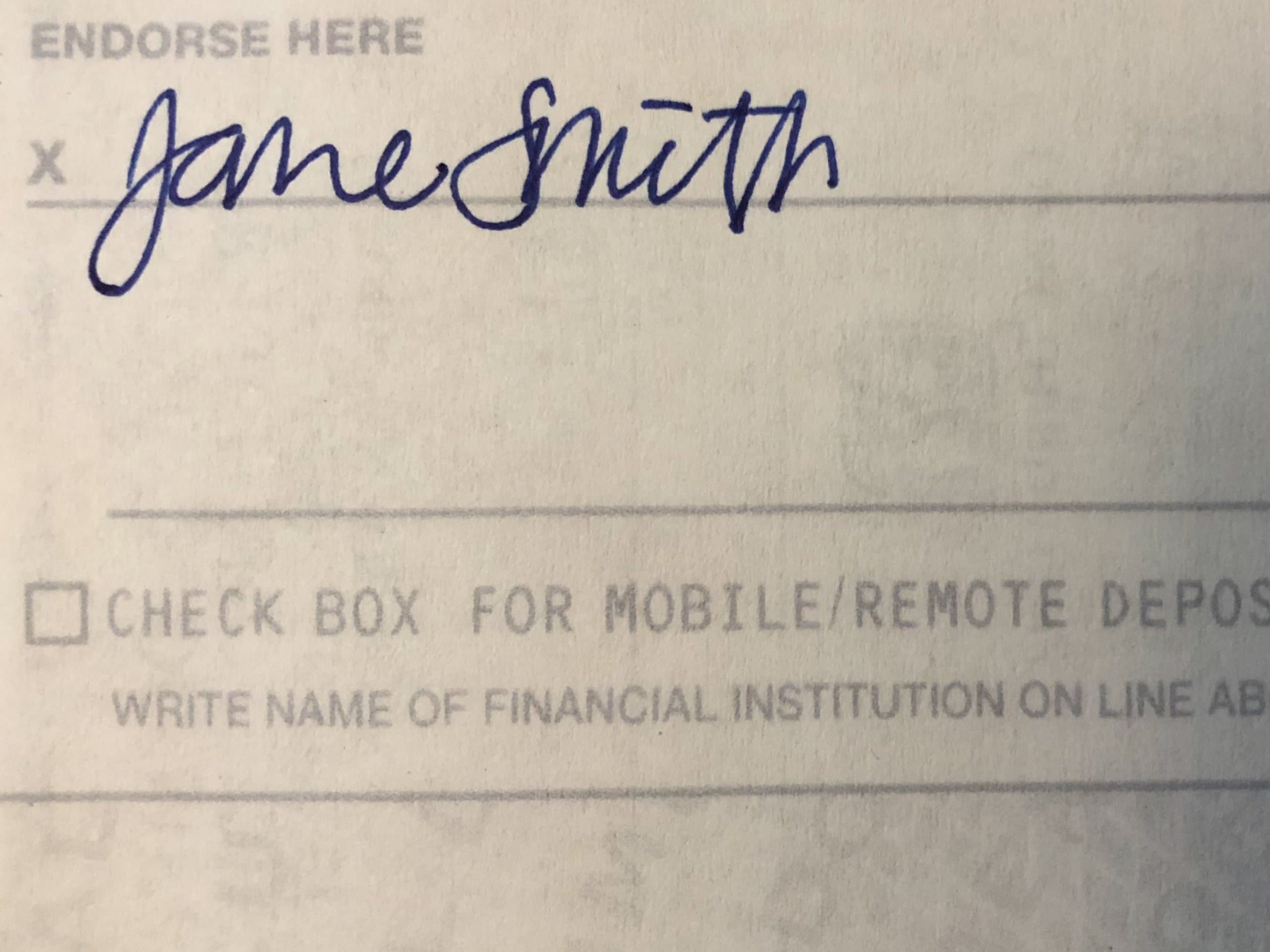 Cheque que muestra un respaldo de "Jane Smith"